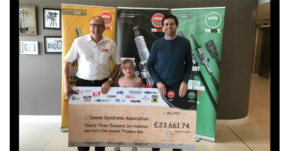 NGK Sales Manager presents cheque to Down’s Syndrome Association