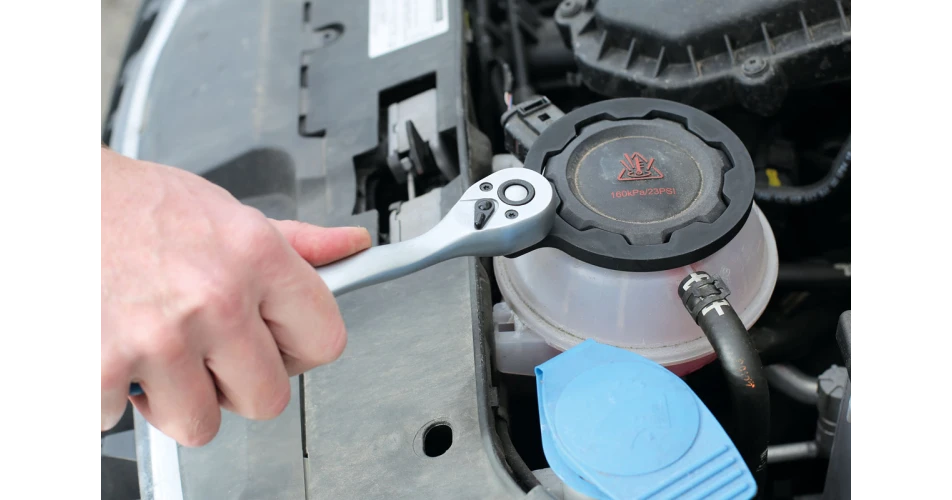 Laser wrench easily removes difficult VW coolant expansion tank caps 