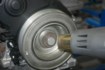 Replacing bolts for belt pulleys