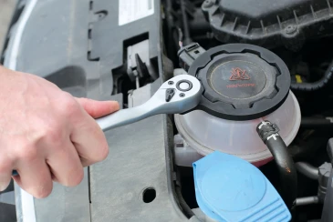 Laser wrench easily removes difficult VW coolant expansion tank caps 
