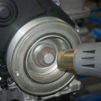 Replacing bolts for belt pulleys